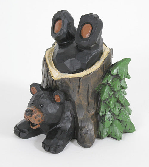 Bear in a Tree Trunk