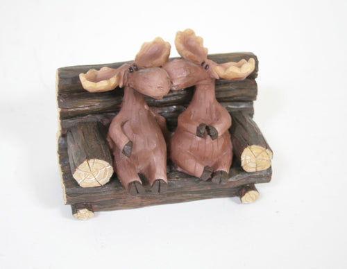Kissing Moose Couple On Log Bench